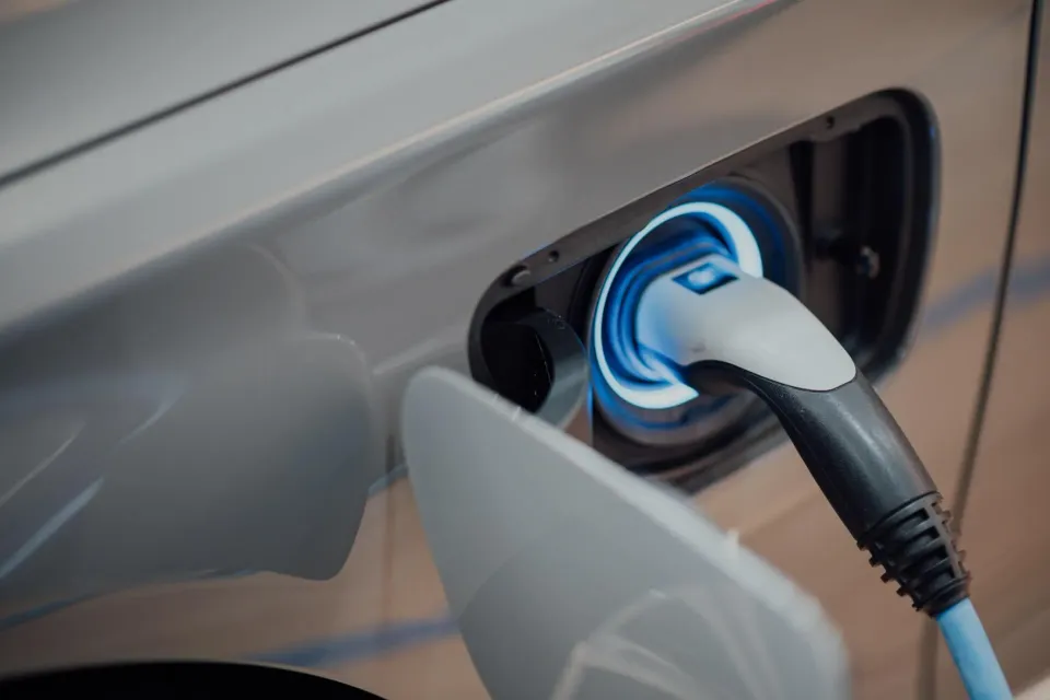 A charging cable connected to an electric vehicle
